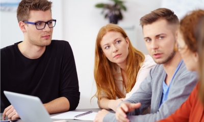 Group of employees discussing cyber crime matters