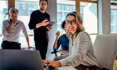 A small business team consider what benefits they will offer employees