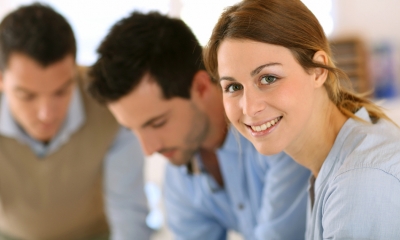 Employment law Group of two men and a woman who is smiling