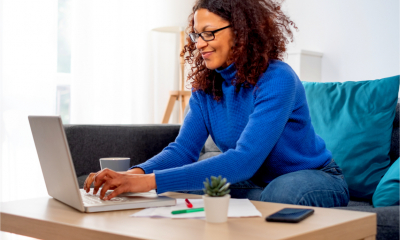 A female freelance works on her laptop