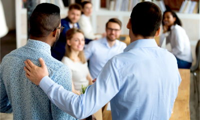 An HR manager introduces a new member of staff to the team
