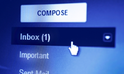 Internet and email law Close up of cursor opening email software