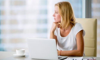 home working contracts uk Woman alone in office - Keeping lone workers safe