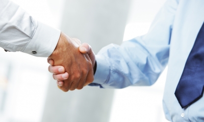 Mergers, joint ventures and cartels Handshake on deal