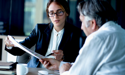 Professional adviser talks a client through a legal document