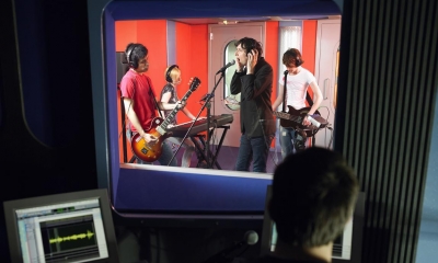 A band records an album is a record label recording studio