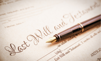 Papers reading 'Last Will and Testament' with fountain pen next to it