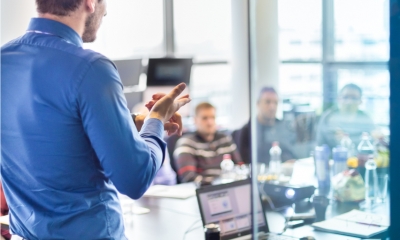 Business coach leading a training session