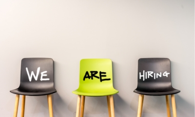 Empty interviewees waiting area representing recruitment struggles