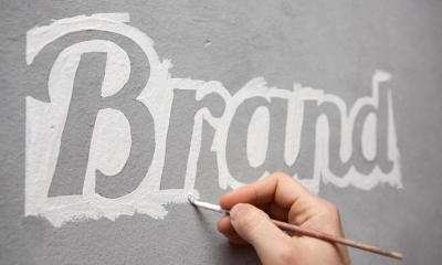 Trade marks The word Brand is outlined in white paint on a grey background