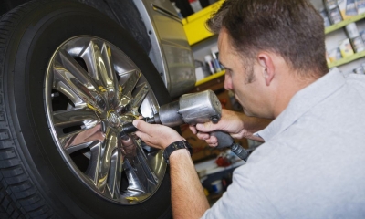 A man fitting tyres