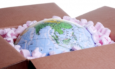 Understand legal issues for exporters World globe packed in box