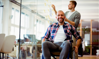 Person on a wheelchair in an office