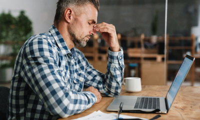 A small business owner is chasing overdue invoices