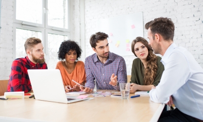 Business owners discussing recent Budget announcement