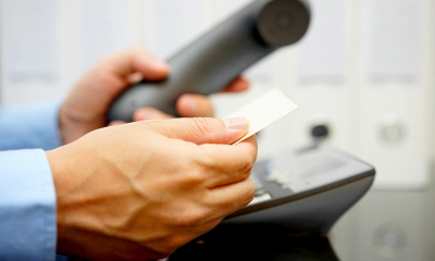 Divorcee calling a free legal helpline on a landline