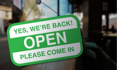 We're open again after quarantine sign.