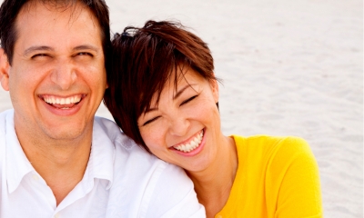 Non-marriage relationships A cohabiting hetrosexual couple laugh as their photo is taken