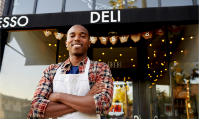 A smiling entrepreneur looks forward to a positive 2022