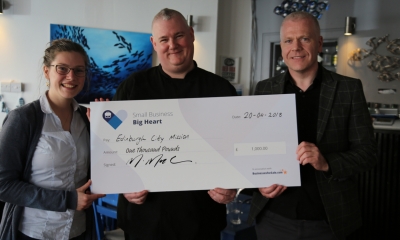 Winner of the awards holding a cheque Winner of the awards holding a cheque