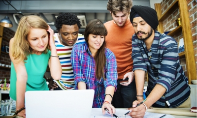 A group of employees working on a project